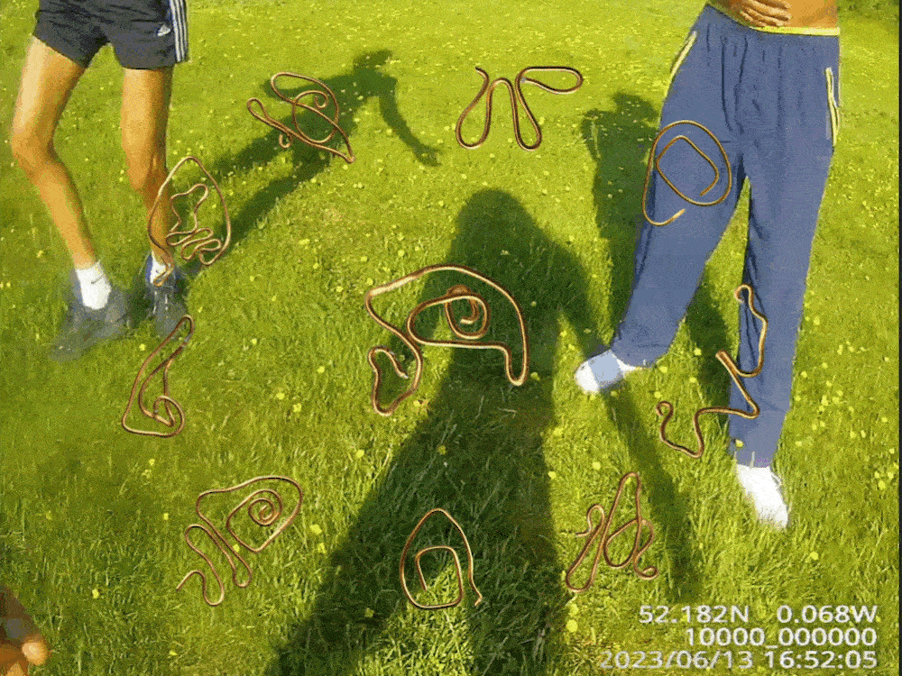 A gif of people in a field, with scribbly sigils laid over them